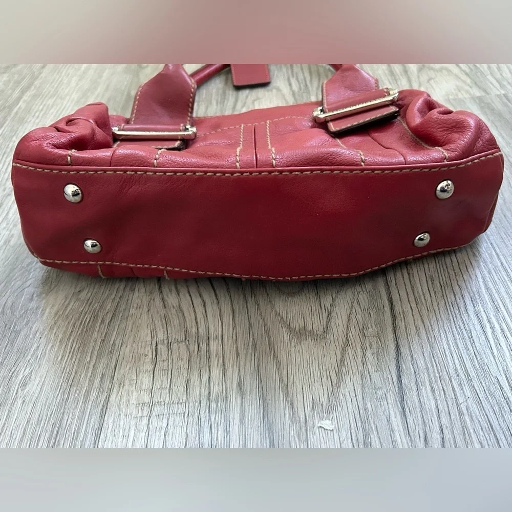 Tignanello Cherry Leather Handbag with Silver Buckle
